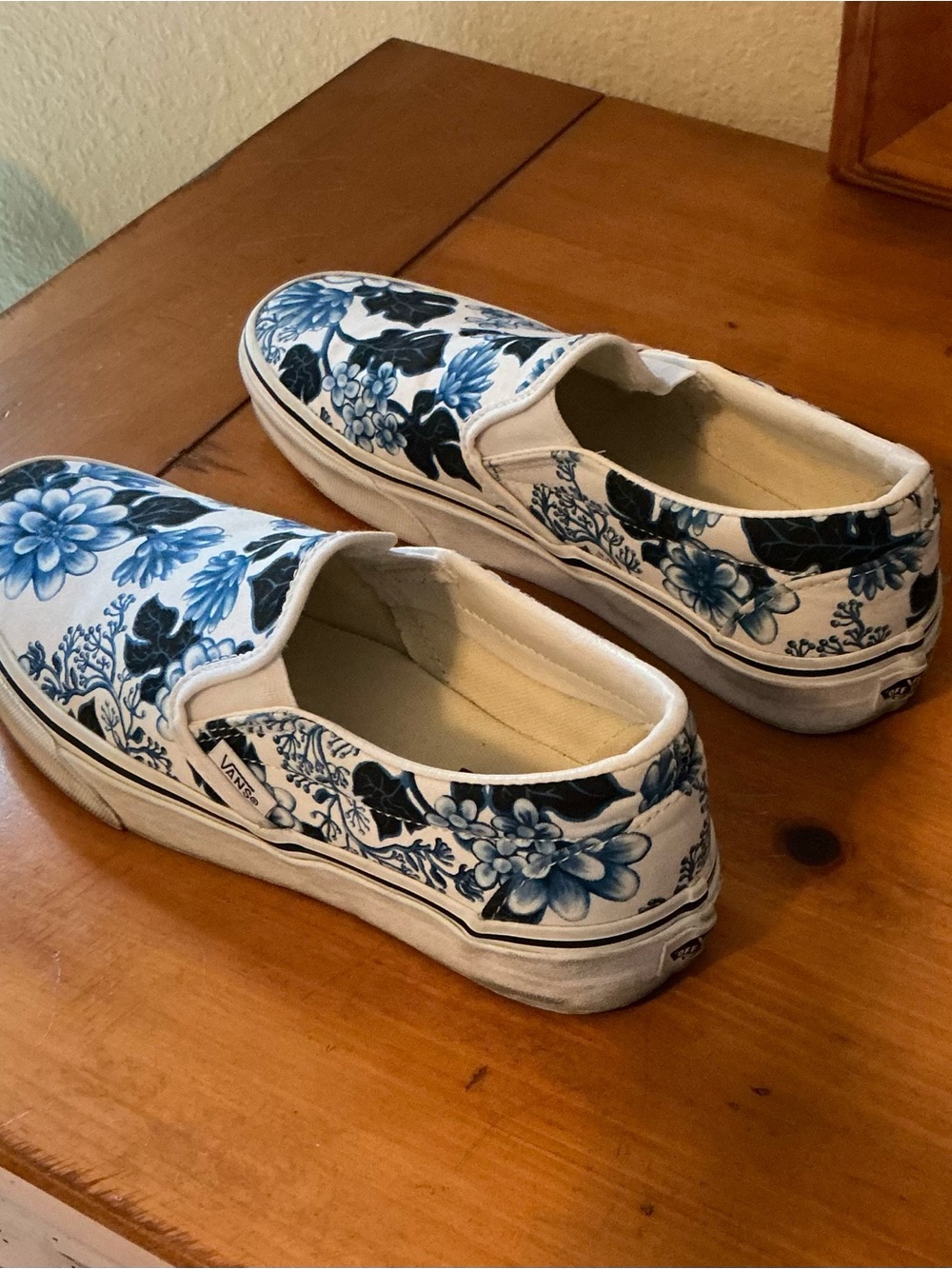 Vans White Slip-On Sneakers with Blue Floral Design